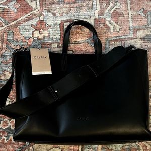 Calpak laptop tote bag. Travel bag with luggage sleeve.
